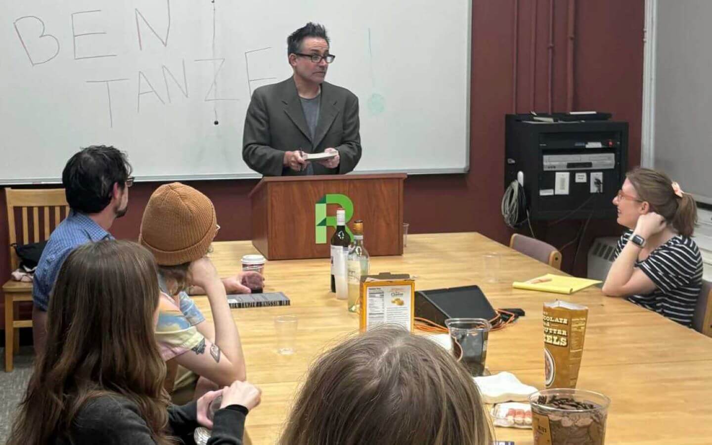 Ben Tanzer giving a lecture in a small classroom of students