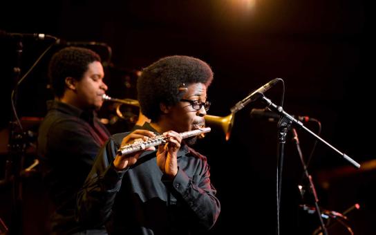 students performing on trumpet and flute