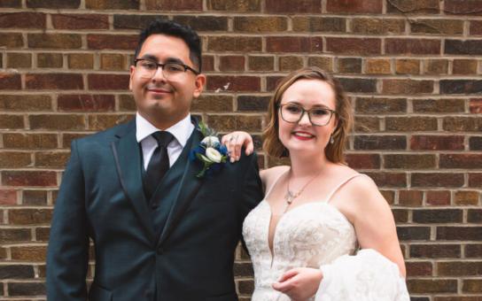 Alumni Adrian Flores and Baylee Allen-Flores in their wedding attire